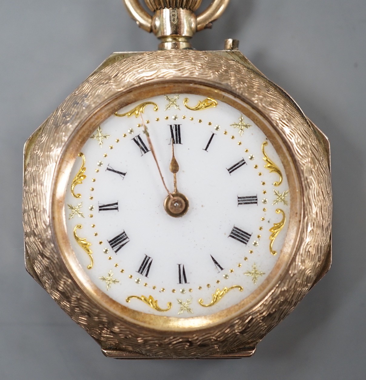 A 1920's 9ct gold and enamel octagonal fob watch, with Roman dial, case diameter 31mm, gross weight 23 grams.